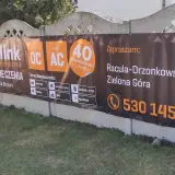 Baner reklamowy Unilink z informacją o ubezpieczeniach w Zielonej Górze.