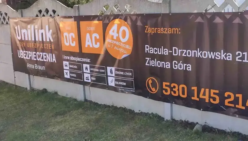 Baner reklamowy Unilink z informacją o ubezpieczeniach w Zielonej Górze.