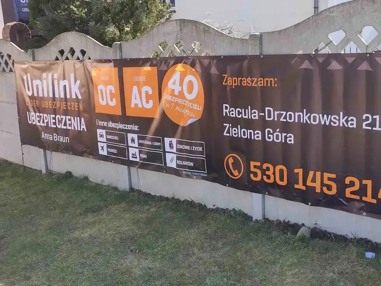 Baner reklamowy Unilink z informacją o ubezpieczeniach w Zielonej Górze.